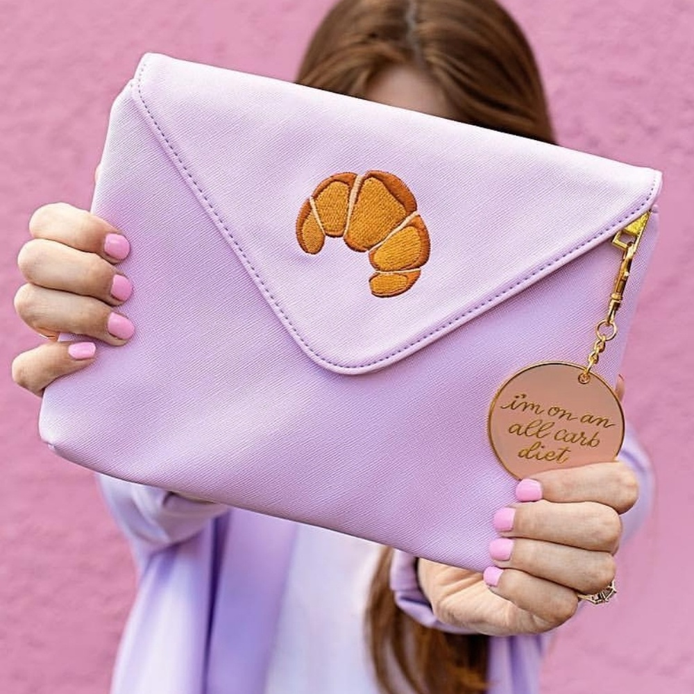 Studio Diy croissant clutch with Keychain flair.